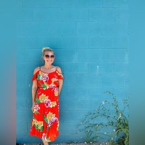 Bright orange dress with flowers for spring break or tropical vacation